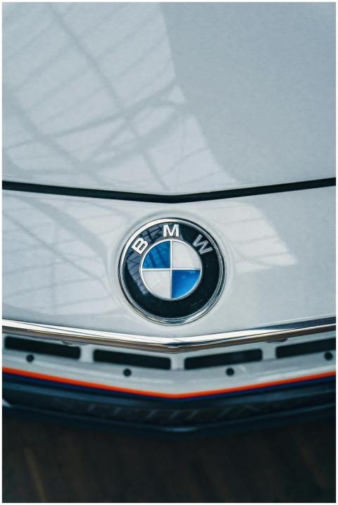 Detailed view of BMW car hood showcasing the iconi