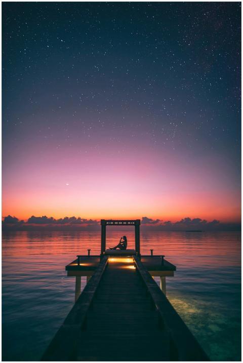 Tranquil scene of a person relaxing on a Maldives