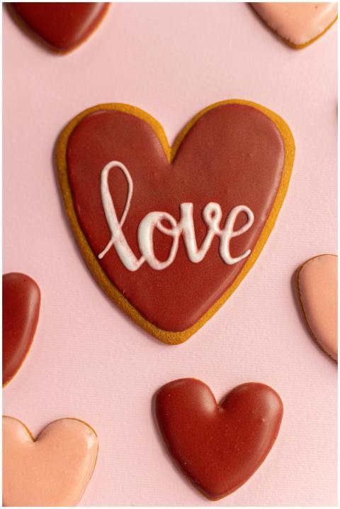 Delicious heart-shaped cookie decorated with love