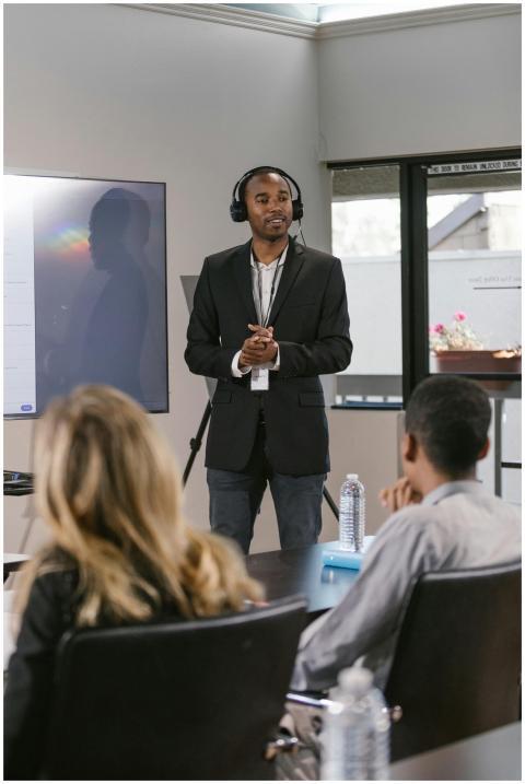 A professional delivers a presentation to a divers