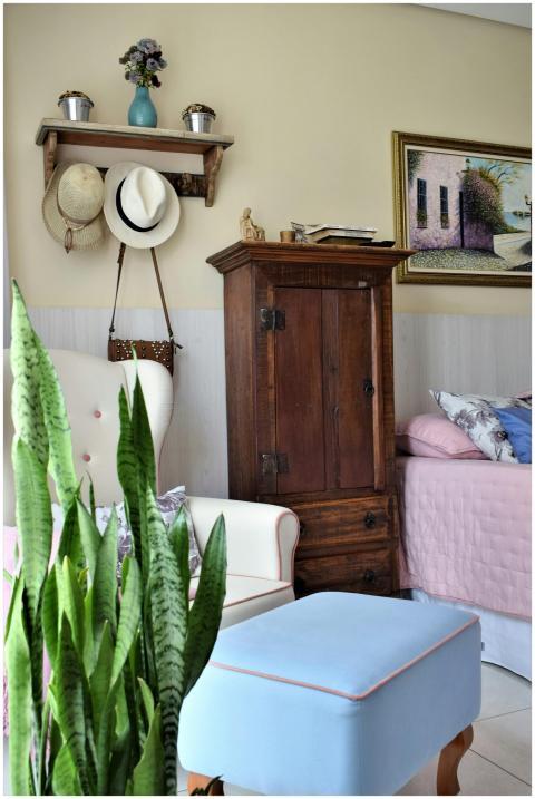 Stylish bedroom featuring vintage wooden furniture