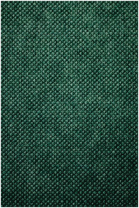Detailed close-up of green textured textile fabric