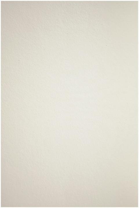 A neutral textured paper surface ideal for backgro