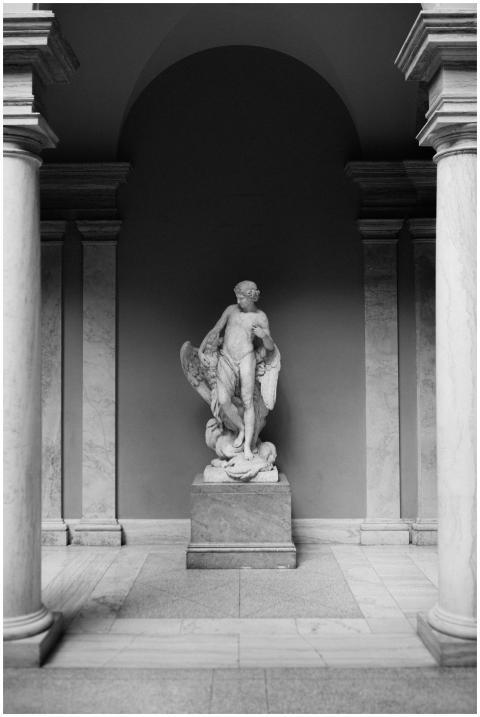 Classic marble sculpture elegantly displayed betwe