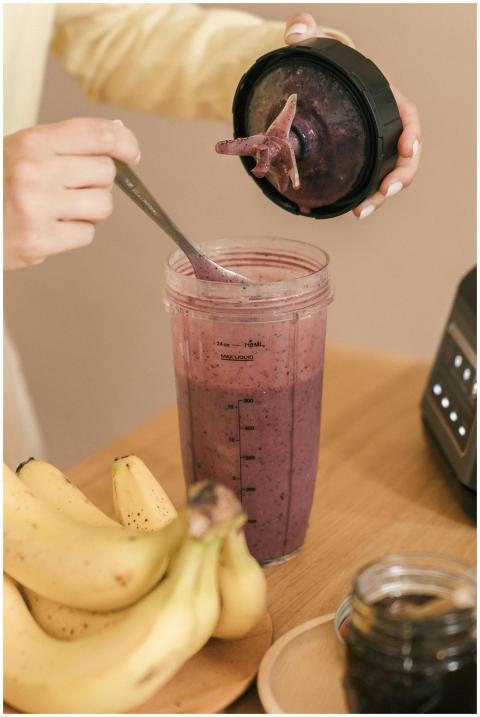 Close-up of a homemade smoothie preparation with b