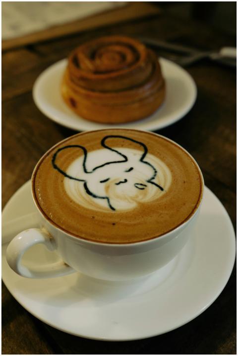 Enjoy a cappuccino with playful rabbit froth art,