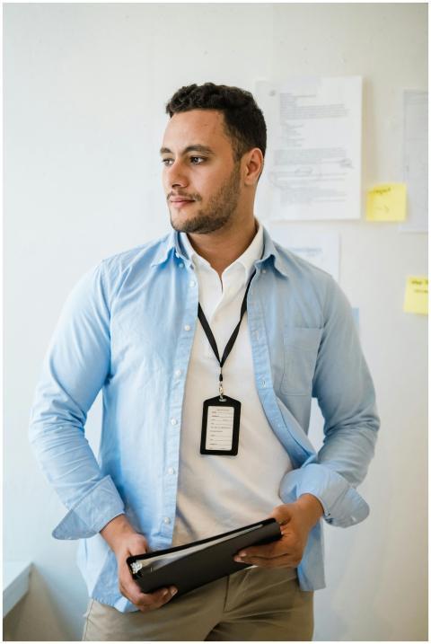 Professional adult male in casual office attire, h