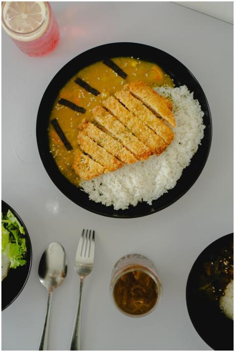 Top view of a Japanese katsu curry dish served wit