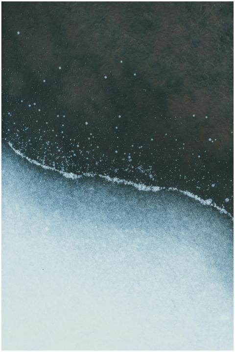 Abstract view of a frozen lake edge capturing the