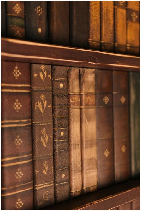 Close-up view of vintage leather-bound books on a