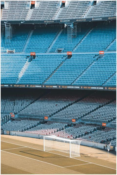 Aerial view of an empty football stadium showcasin