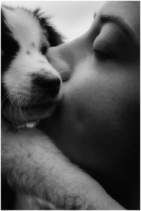 Close-up black and white photo of a woman affectio