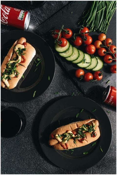 Gourmet hot dogs served with fresh vegetables and