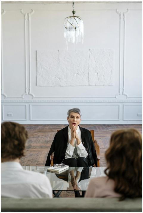 Therapist discussing relationship issues with coup