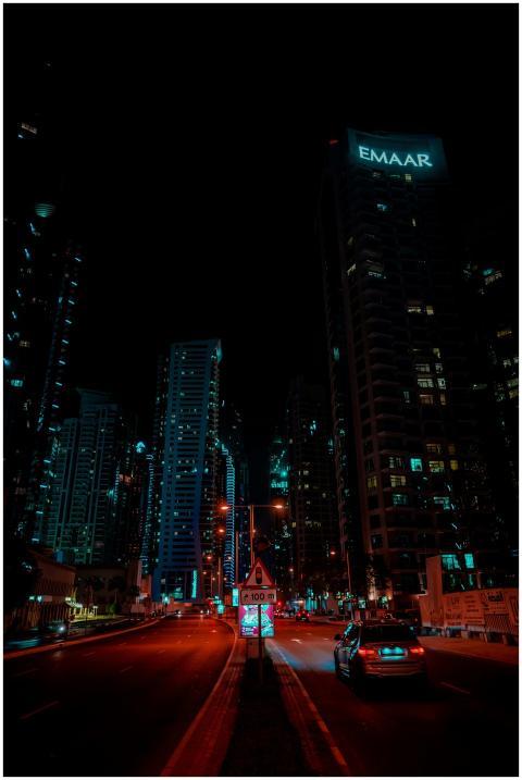 Night view of Dubai's skyscrapers with illuminated