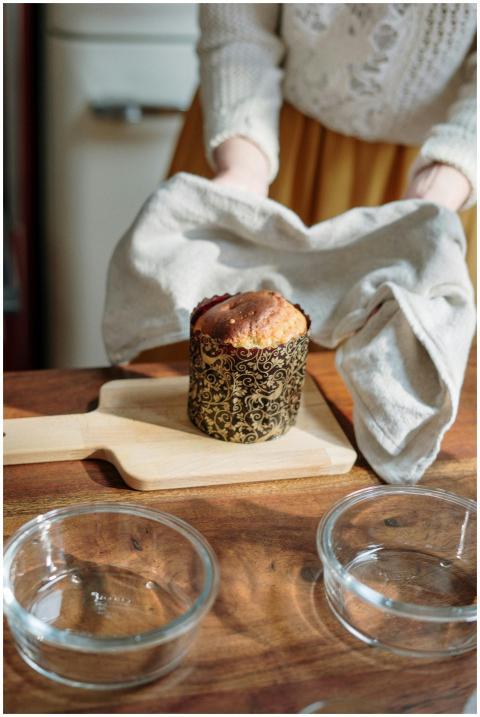 Woman preparing delicious homemade Easter cake in