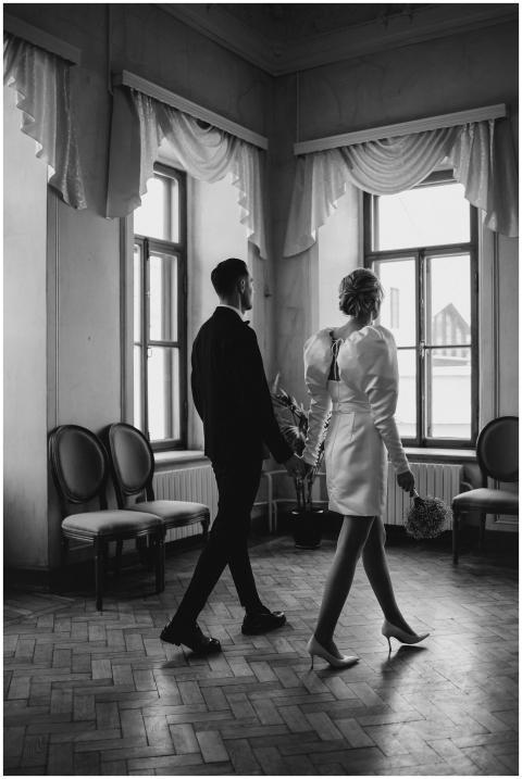 Black and white photo of a couple in formal attire