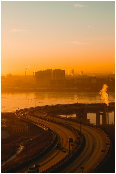 Beautiful cityscape with highway and river under a