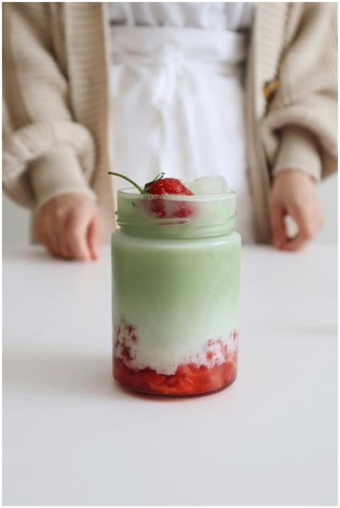 Delicious homemade strawberry matcha latte with ic