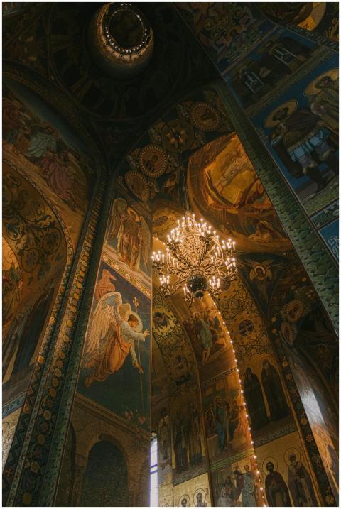 Low-angle view of a church interior with ornate fr