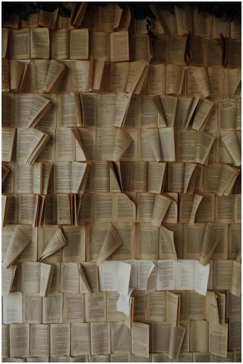 A captivating display of old open books arranged v