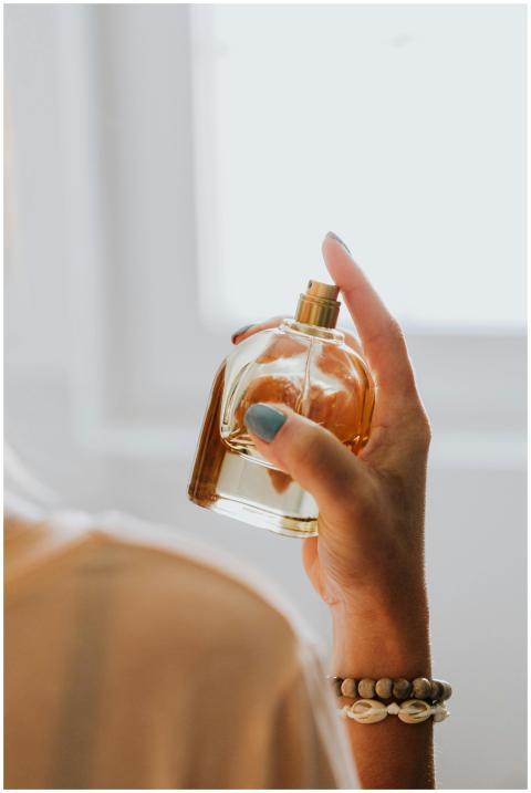 Close-up of a woman's hand with bracelets holding