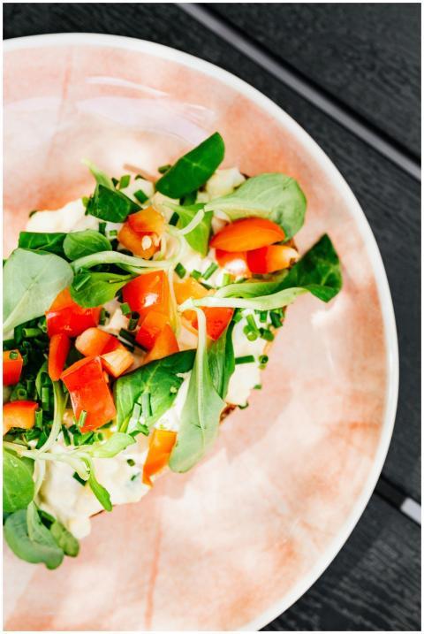 Vibrant salad with fresh tomatoes, leafy greens, a