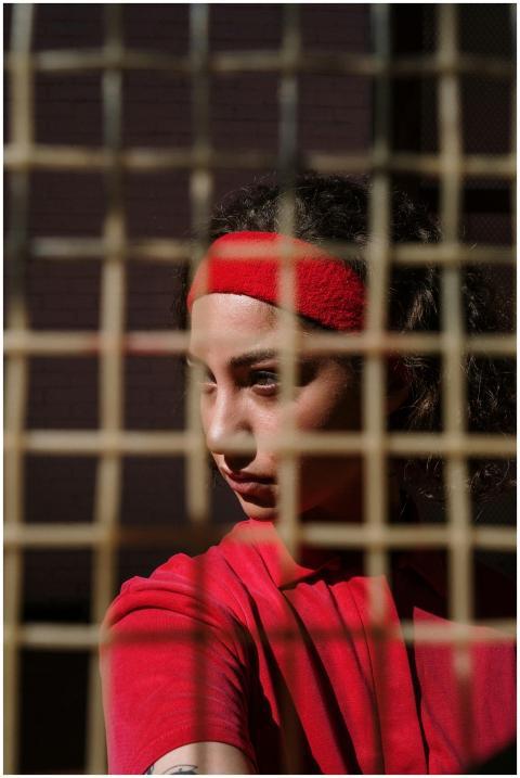 Dynamic portrait of a focused tennis player with a