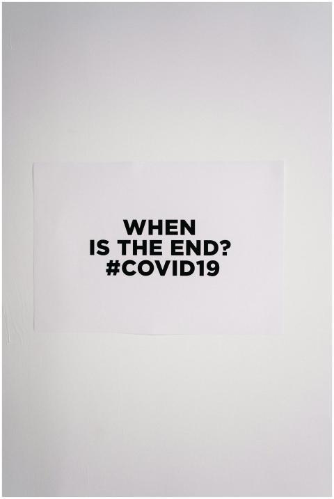 A simple poster asking about the end of COVID-19 w