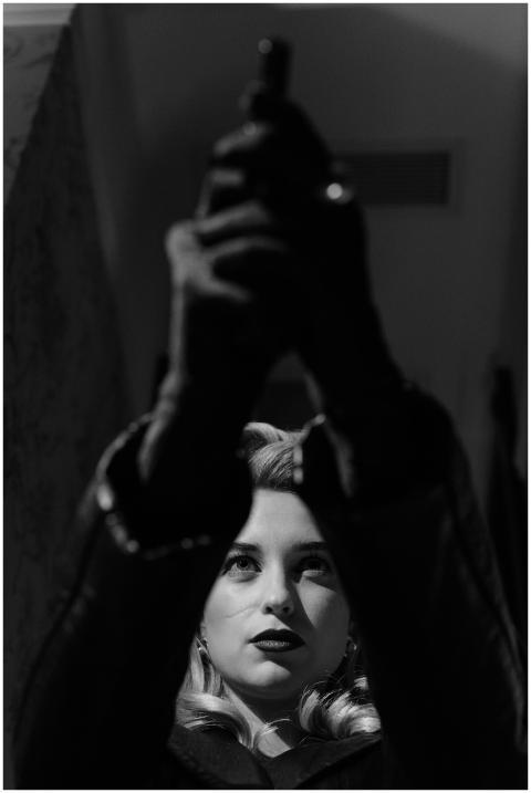 Black and white photo of a mysterious femme fatale