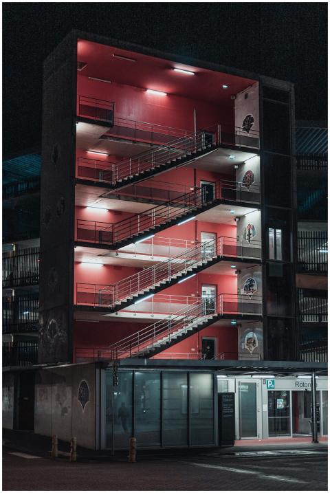 Striking night view of a modern multi-storey build