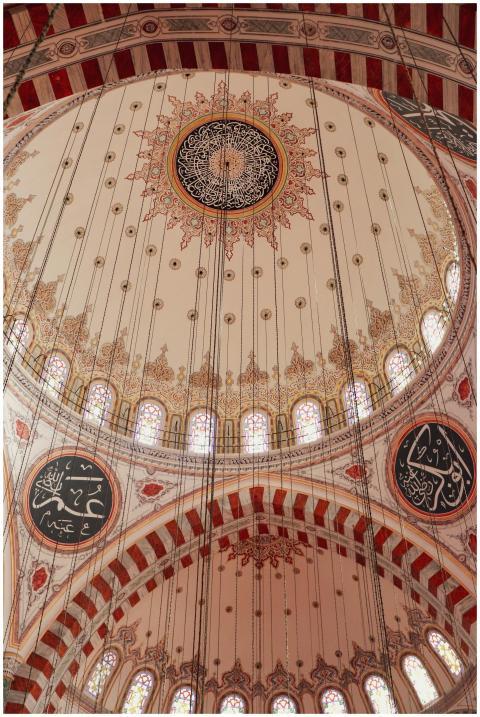 Beautiful interior view of a mosque's ornate ceili