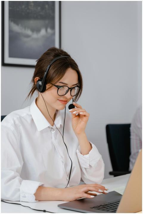 Professional woman using headset for customer serv