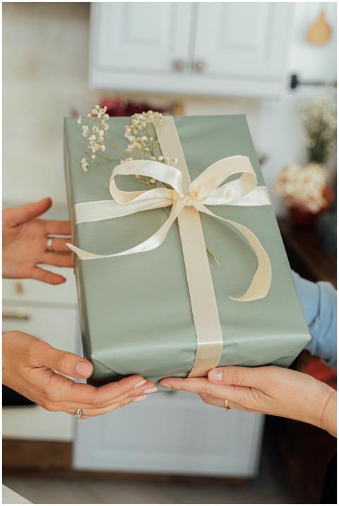 A close-up of two people exchanging a beautifully