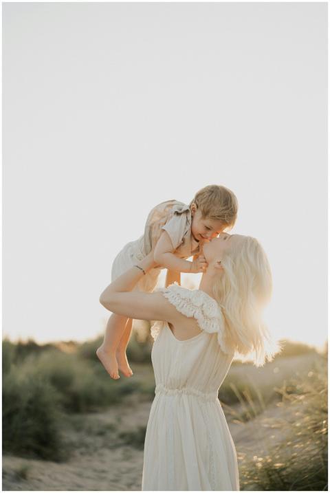 A serene moment of a mother embracing her child on