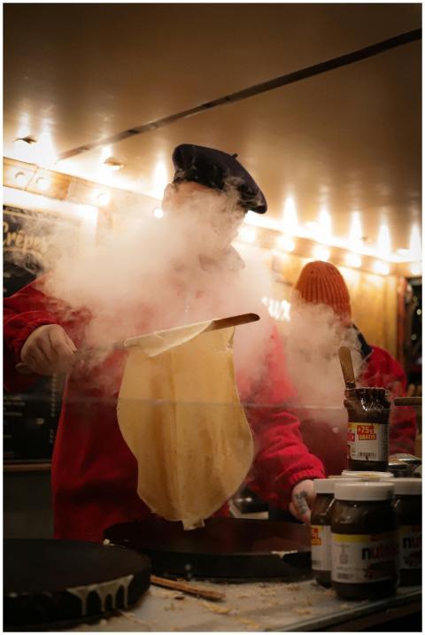 A chef prepares delicious French crepes at a vibra