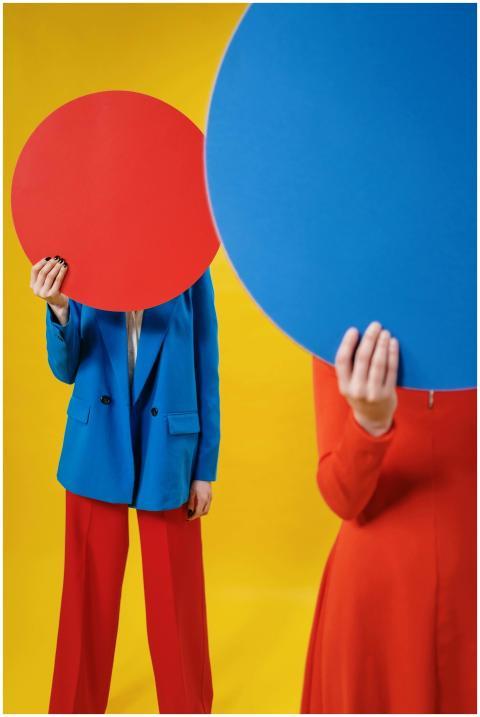 Unrecognizable female models in fashionable outfit