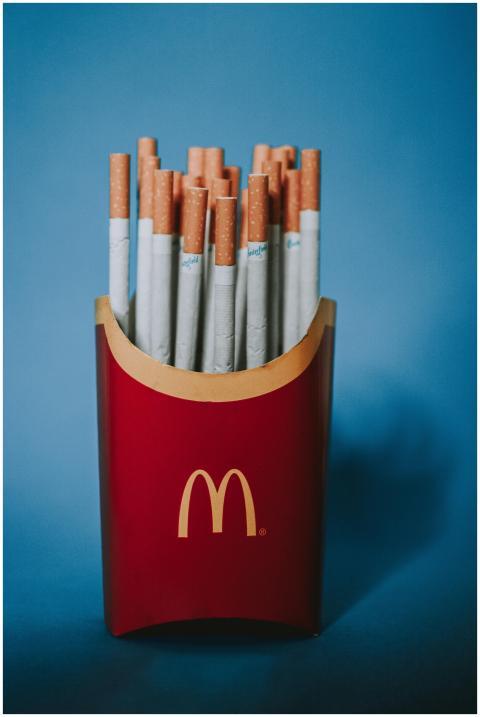 Red and yellow paper packet from french fries fill