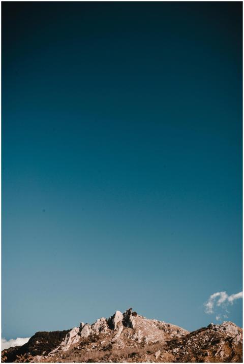 A breathtaking view of a rocky mountain peak with