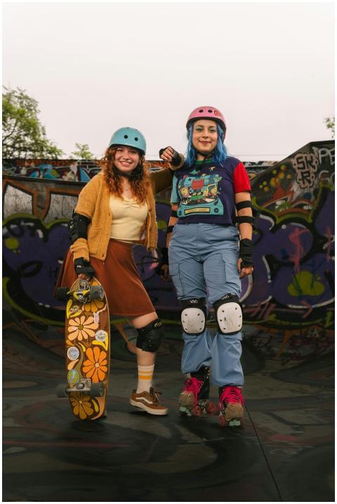 Two young adults enjoying skateboarding and roller