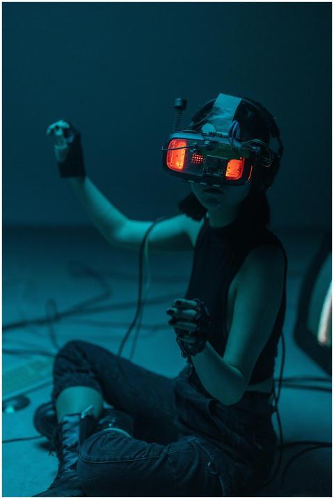 Woman exploring futuristic virtual reality with VR