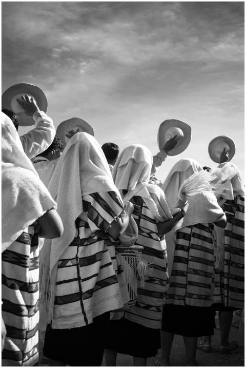 Black and white photo of a traditional dance in Oa