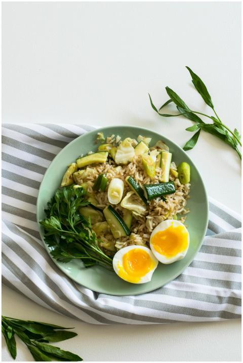 A top view of a healthy vegetable rice dish with s