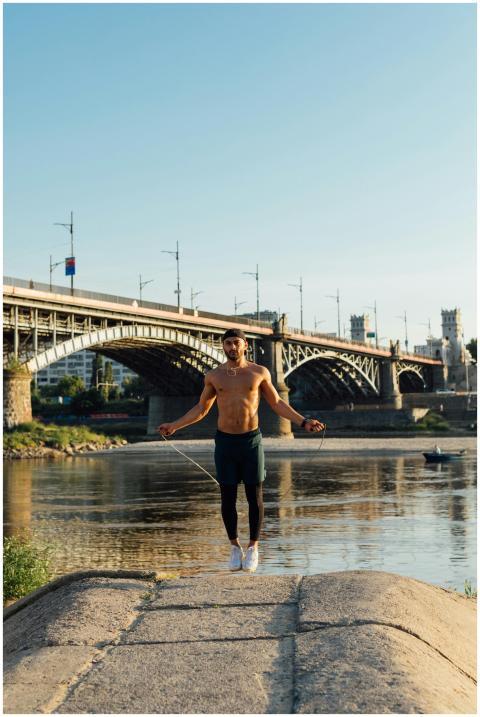 A man exercising with a skipping rope on a riversi