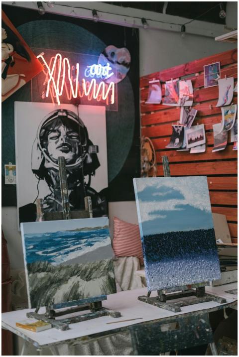 Creative art studio featuring colorful canvas pain