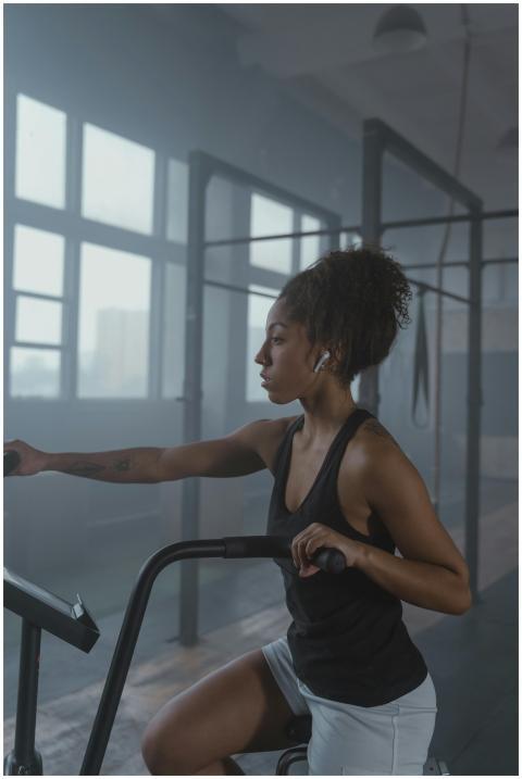 African American woman intensely working out using