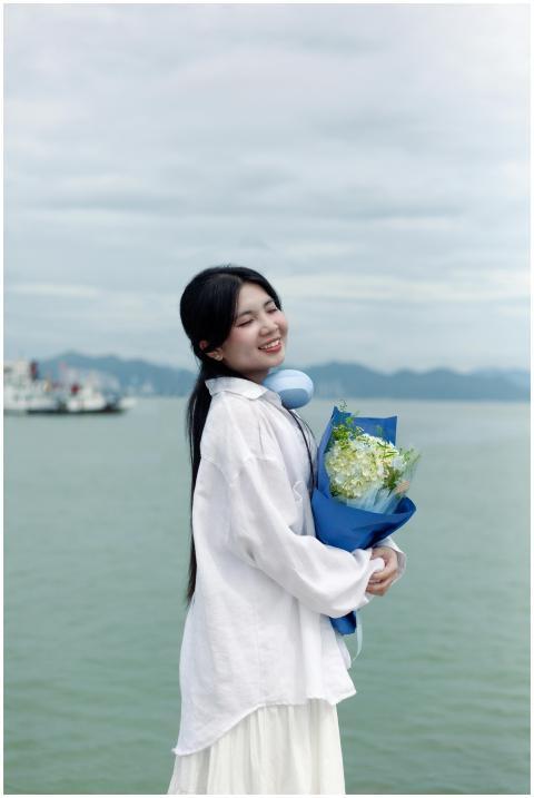 Young Woman Smiling Flowers