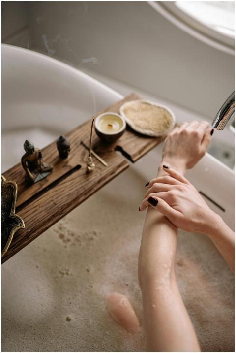 Aromatic bath ritual with candle, incense, and nat