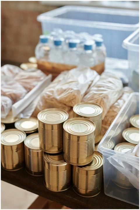 A variety of canned goods and packaged items arran