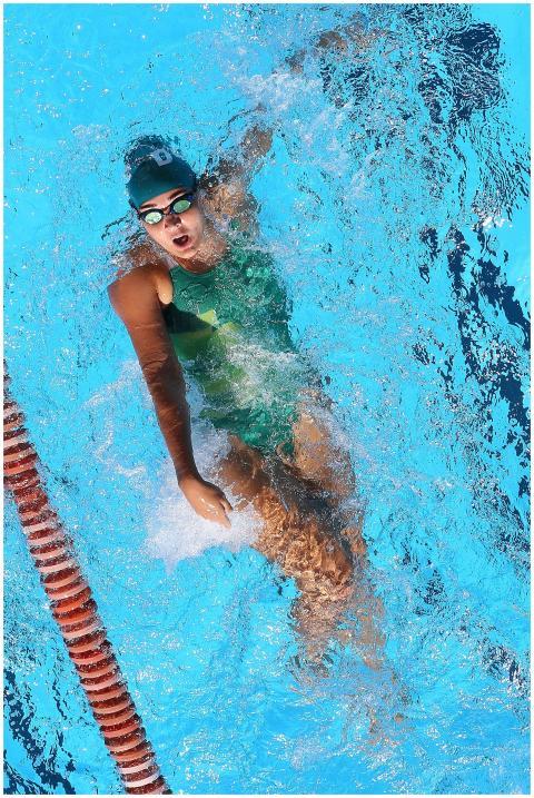Aerial view of a female swimmer in a green swimsui
